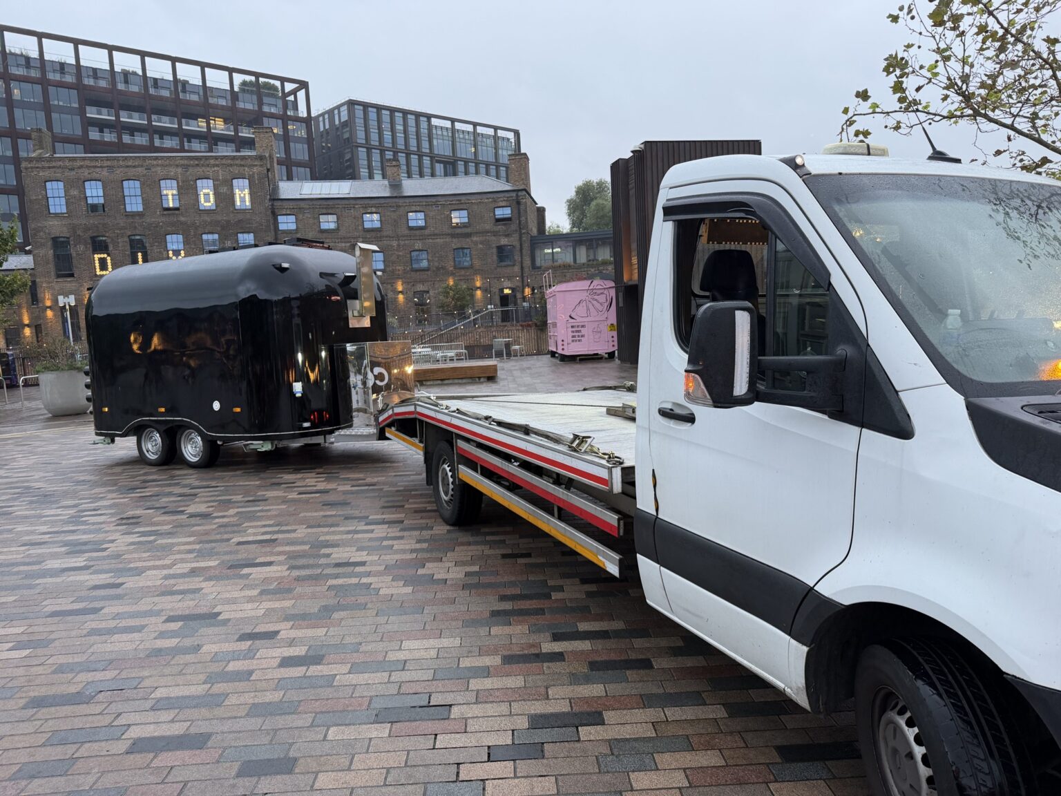 Caravan Trailer Transport London 3 RecoveryCar flatbed towing a trailer near King's Cross, London N1C