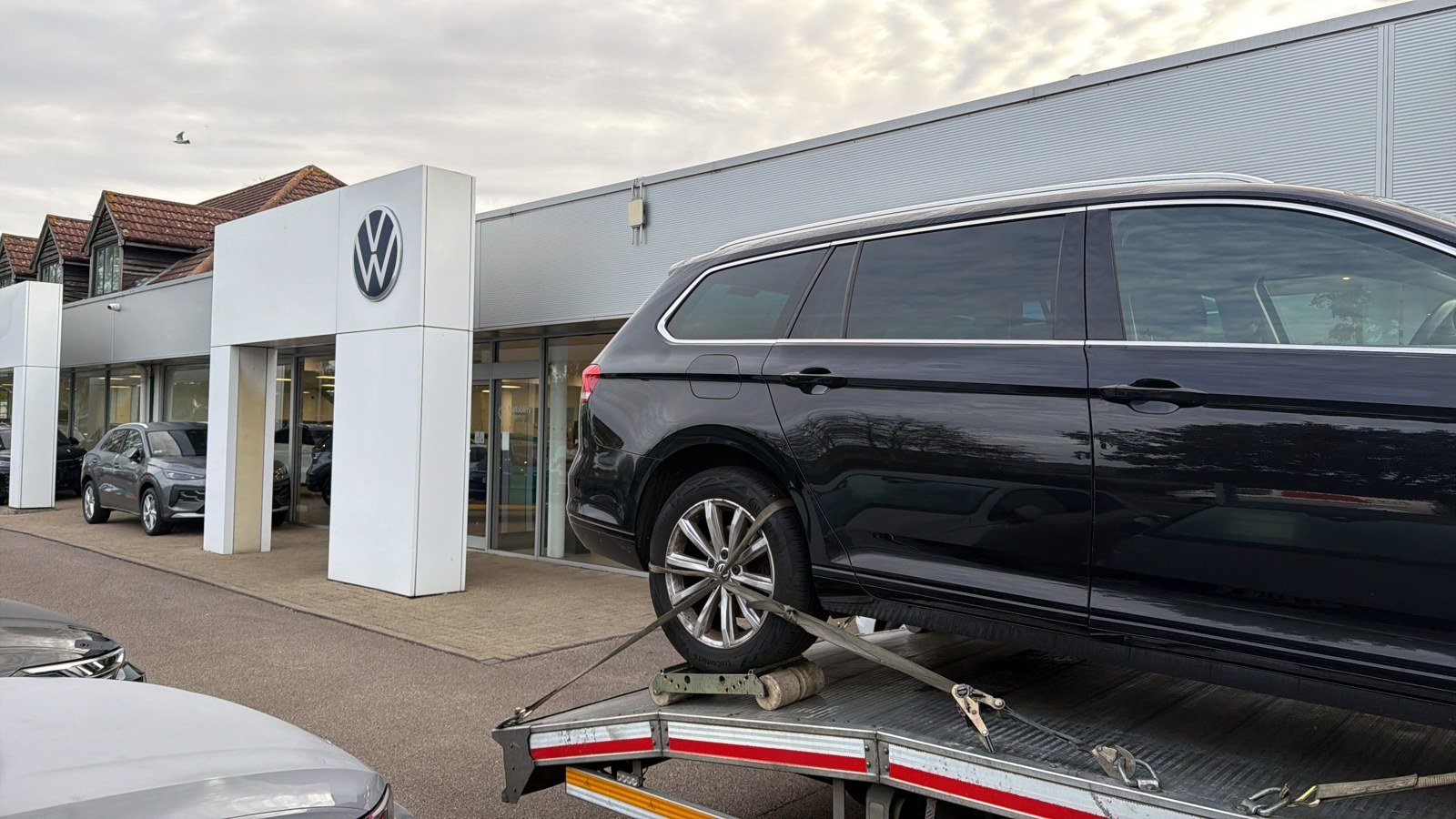VW Passat delivered to a main dealer on a Recovery Car flatbed, South East London