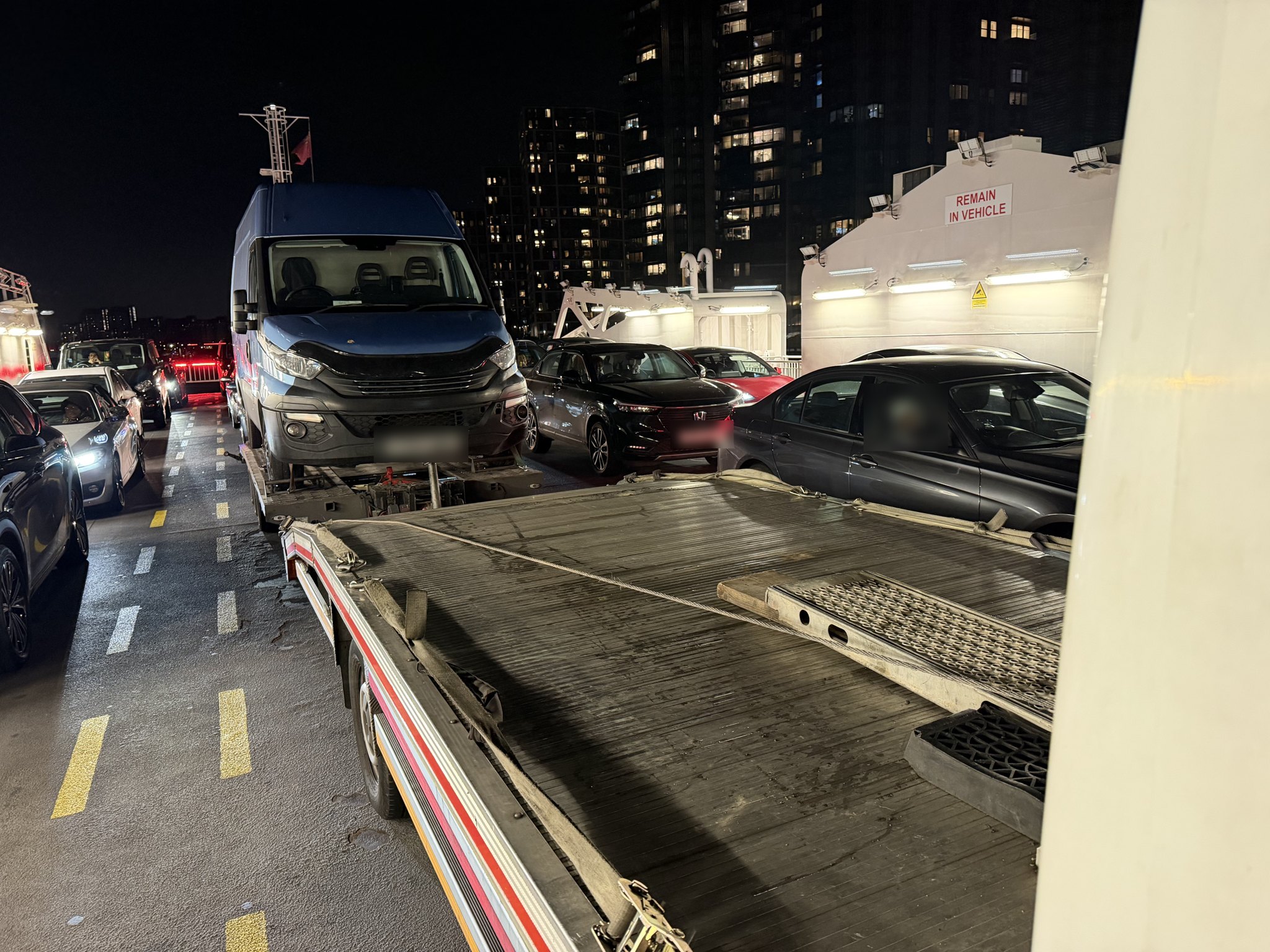 Van Towing in South East London: Late-Night Recovery Across the Woolwich Ferry 6 Van towing across the Woolwich Ferry at night - Iveco Daily on a RecoveryCar flatbed